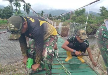 Kodim 0108/Agara dan Masyarakat Percepat Finishing Jembatan Gantung di Desa Kuta Ujung
