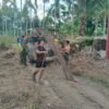 Kodim 0108/Agara  dan Warga Kompak Turunkan Material Pondasi Jembatan Gantung Perintis Garuda